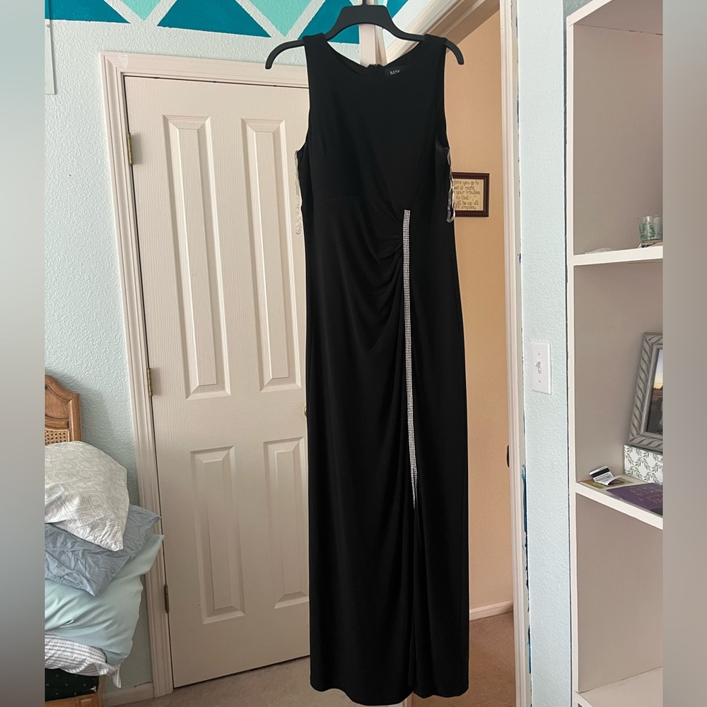 Elegant black dress with small front slit